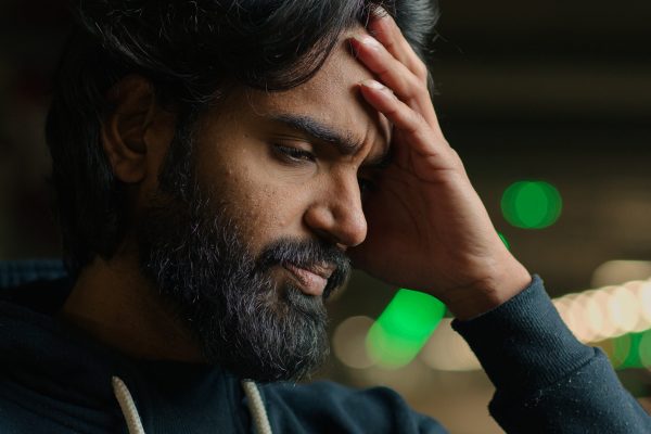 Arabian unhappy bearded man unhealthy guy feel stress anxious worried at parking lot headache depressed Hispanic Indian male making complicated decision difficult divorce job loss business bankruptcy. High quality 4k footage